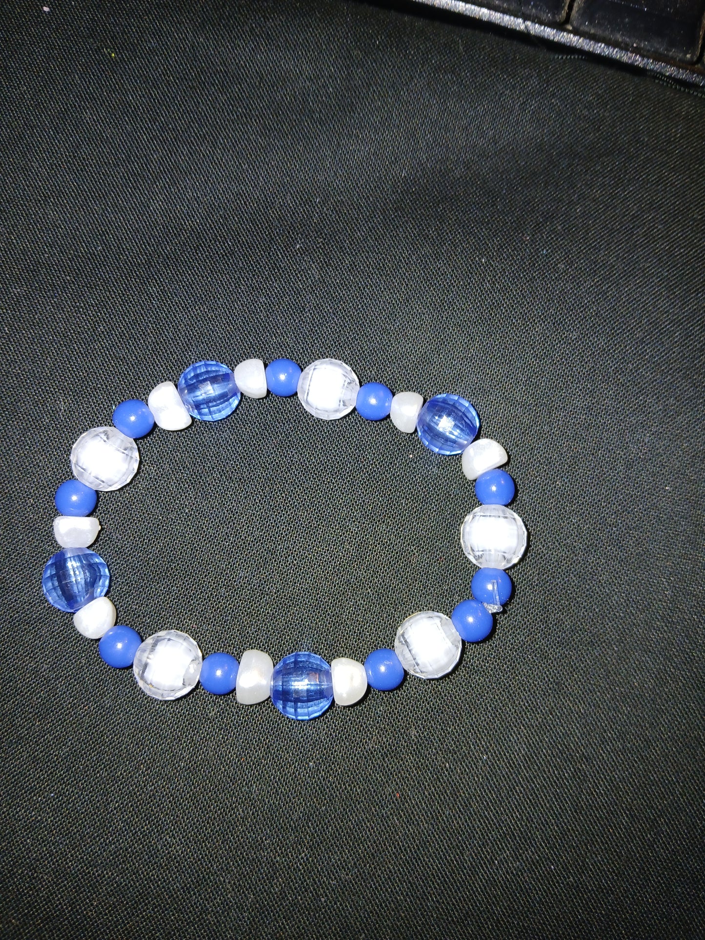 Handmade blue and white bracelet.