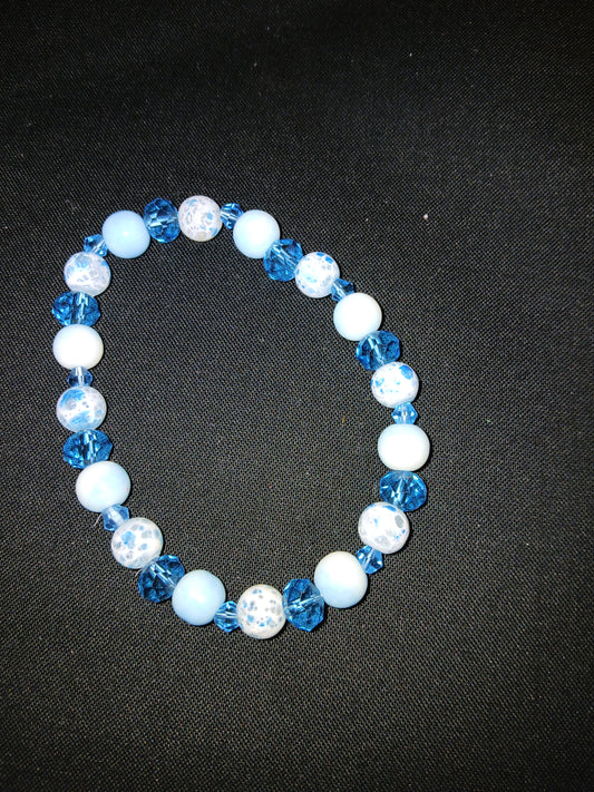 Handmade multi colored blue and white bracelet.