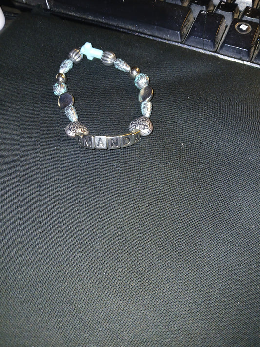 Handmade silver, blue, black with name, cross and hearts bracelet.