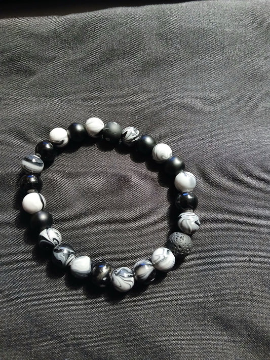 Handmade black, gray, and white bracelet.