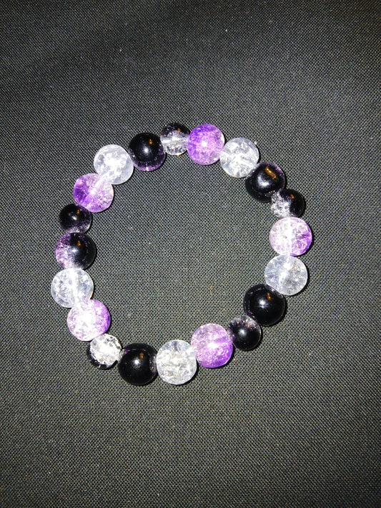 Handmade black, purple and clear glass beads bracelet.